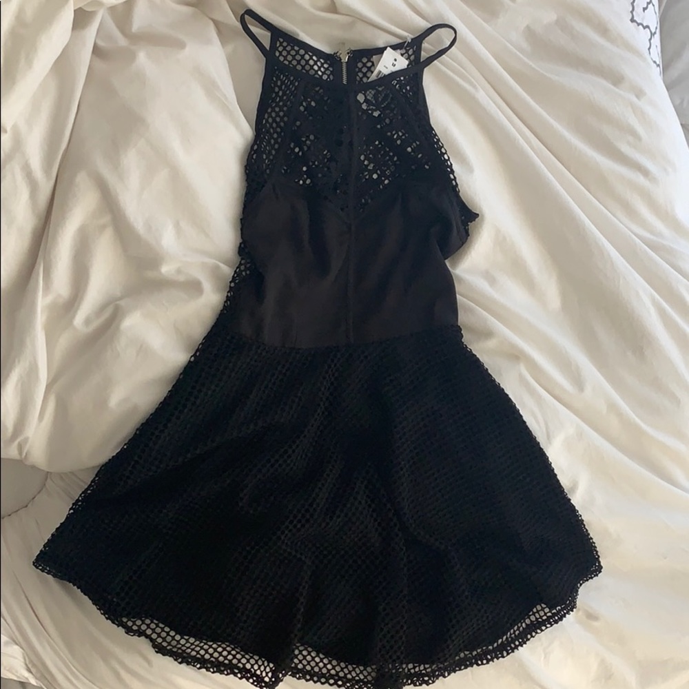 LF black dress with lace and textured detail